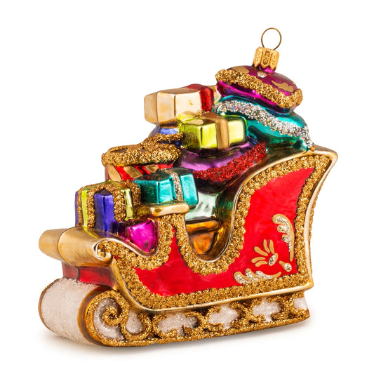 Huras Family Sleigh with Gifts and Pillows