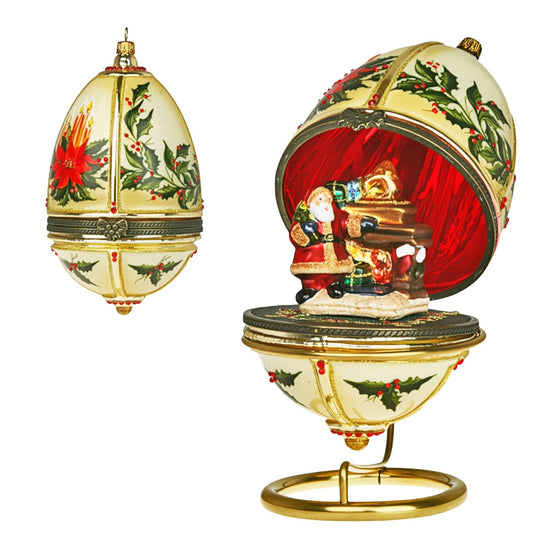 Acquista in Italia Komozja Family Natale 2025 Uovo a cerniera con Babbo Natale vicino al camino