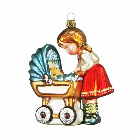 Acquista in Italia Komozja Family Natale 2025 Bambina con una carrozzina